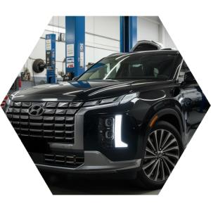 Хендай Палисад готовится к замене амортизаторов в автотехцентре