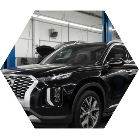 Хендай Палисад готовится к замене свечей зажигания в автотехцентре